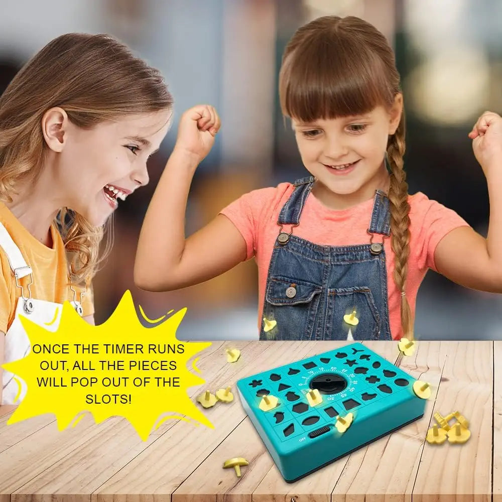 Two girls are playing with a teal shape matching puzzle game, showing how pieces pop out of the slots.