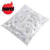 A pile of clear disposable shower caps with elastic, packaged for sale.
