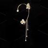 Gold butterfly flower ear cuff with sparkling zircon detail for no piercing needed