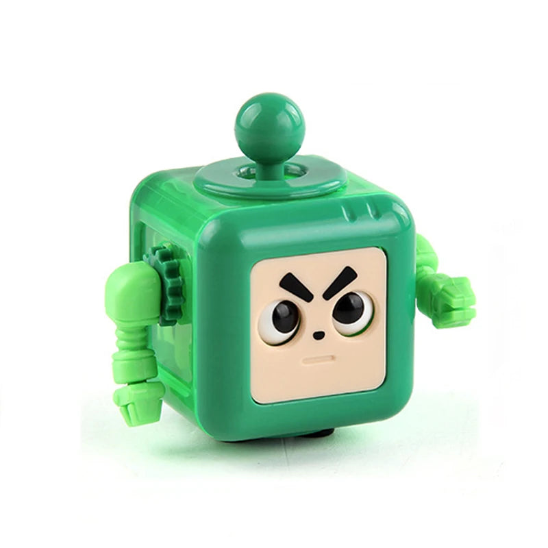 Cubo fidget verde con cara cuadrada y ojos enojados, parte superior redonda y agarres laterales.