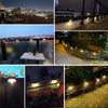 A collection of solar powered deck lights illuminating outdoor steps, patios, and pathways at night.