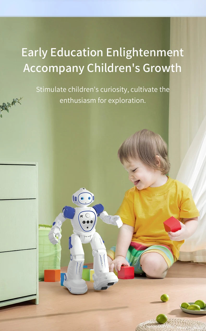 A young child is interacting with a white and blue robotic toy designed for early education.