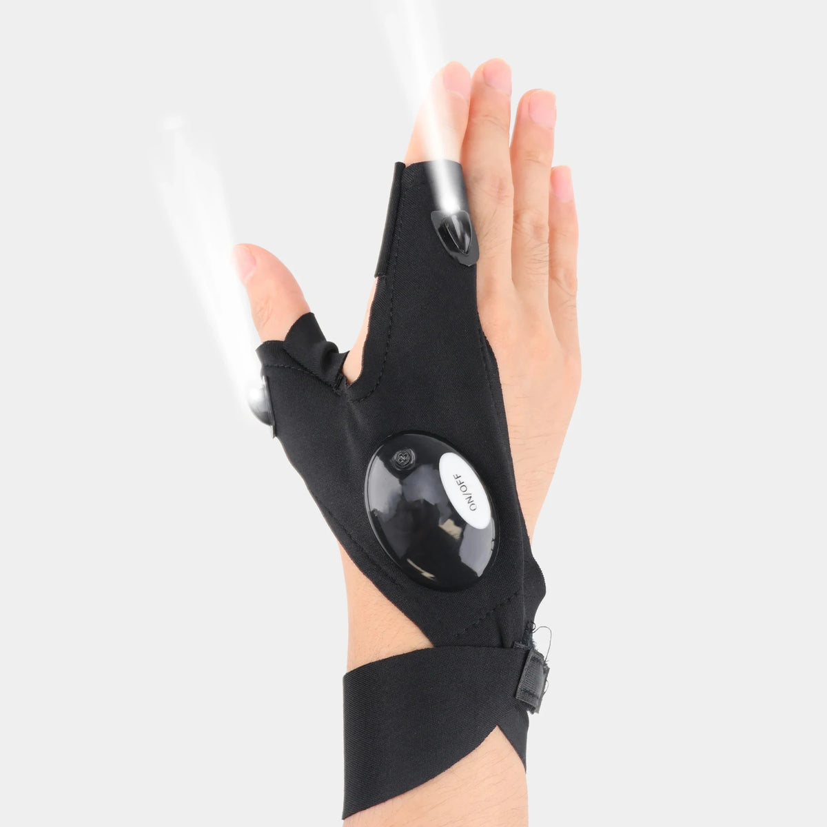 A hand wearing black LED fingerless gloves with a built-in flashlight, demonstrating the light beam.