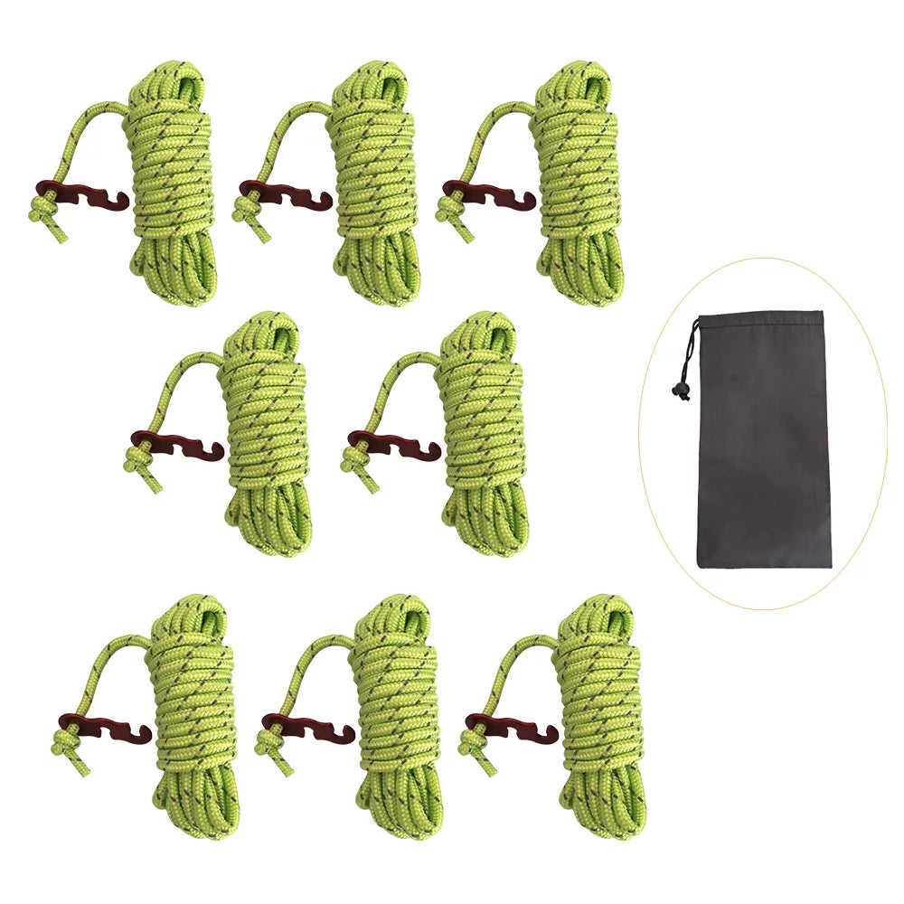 A set of six bright green reflective camping guy lines with aluminum tensioners shown individually.