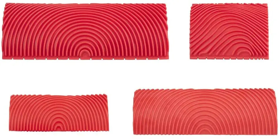 Two pieces of red rubber wood grain texture rollers for DIY wall painting.