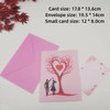 A pink card featuring a red heart-shaped tree silhouette with a couple standing beneath it.