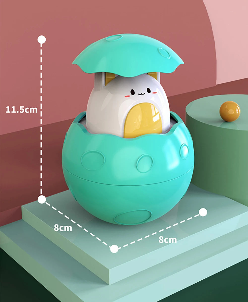 A light teal bath toy featuring a cute duck and penguin head with a water spray function, shown on a tiered platform.
