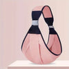 A soft cotton baby ring sling carrier in pink and navy fabric is displayed on a white surface.