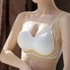 A close-up of a seamless wireless push-up bra in white and beige tones worn by a model.