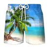 Blue swim trunks featuring a tropical coconut tree print on a beach background.