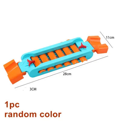 A set of orange and blue marble run building blocks with tracks and funnels.