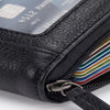 A black leather compact zipper card holder with a visible RFID chip and colorful cards inside.