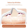 A white 3D eye massager device is shown with light therapy being applied to the eye area.