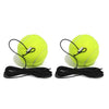 Gul tennisøvelsesball med svart elastisk snor og stabil base.