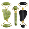 Set de rodillo de jade natural y herramientas gua sha en tonos verdes y negros para masaje facial.
