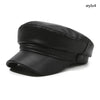 Black PU leather beret hat with a folded brim shown from the side.
