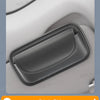 A black PU leather visor sunglasses case with a hook-and-loop strap shown on a light gray surface.