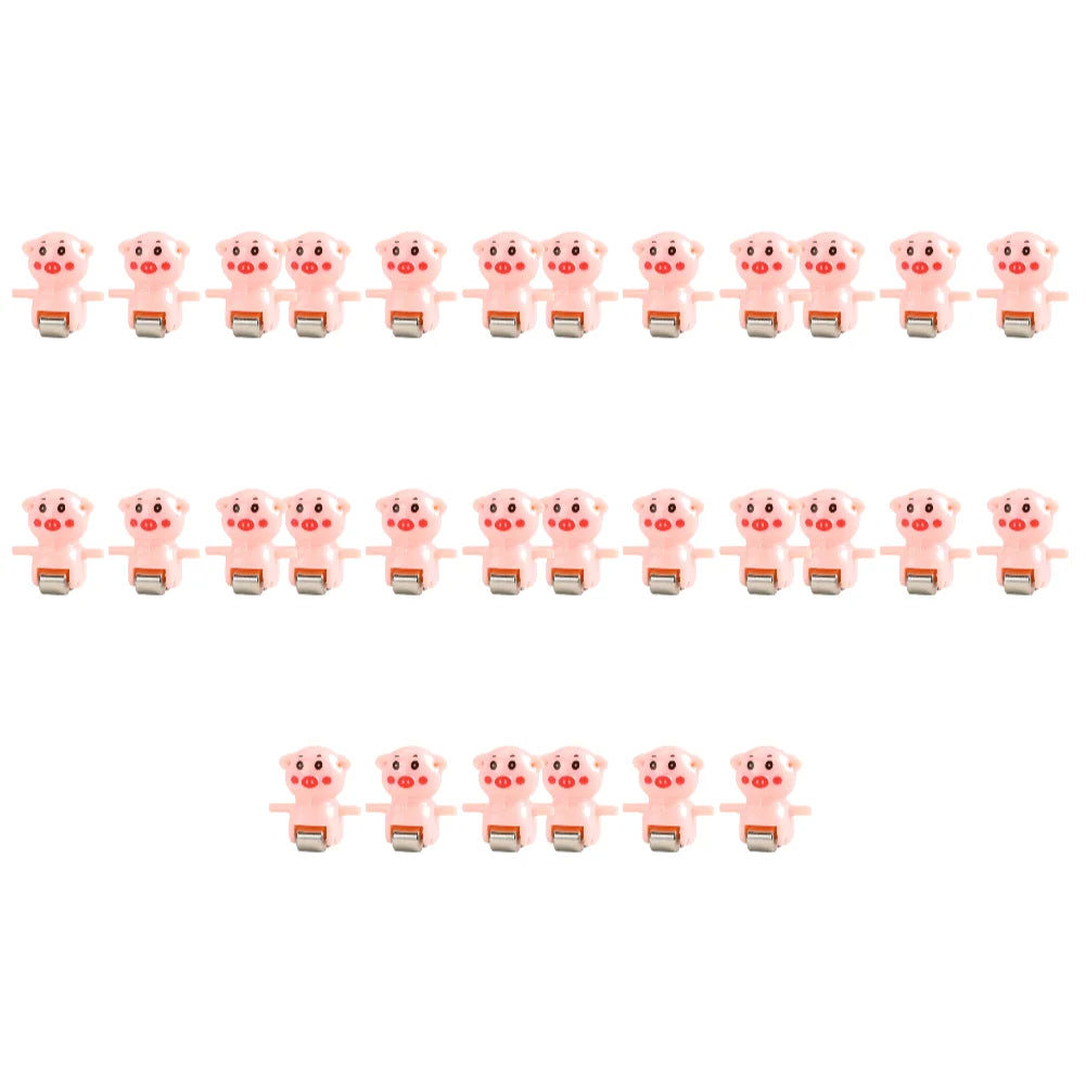 A set of pink animal racing car climbing stairs toys arranged in a single row.
