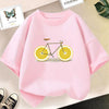 Pink kids t-shirt featuring a graphic print of a bicycle with lemon wheels