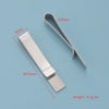 A silver metal tie clip shown with dimensions and weight specifications.
