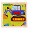 A colorful wooden puzzle featuring a blue construction vehicle and green landscape.