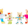 Four wooden puzzle bears dressed in colorful clothing and accessories for children