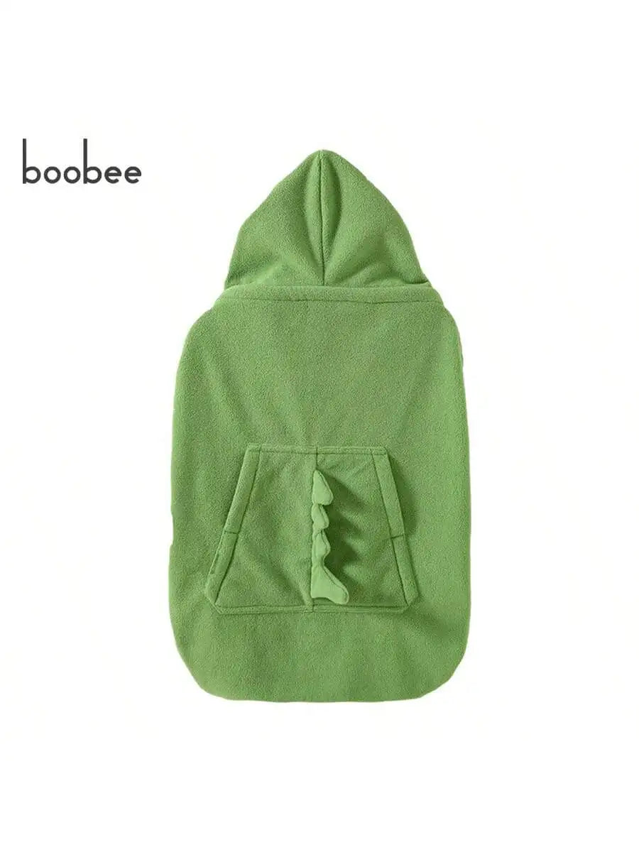 A olive green baby windproof carrier and stroller blanket with a dinosaur design.