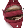 A maroon lightweight oxford cloth mini backpack with a zippered main compartment and a separate pocket.