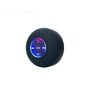 A black compact waterproof Bluetooth speaker with a circular control panel showing light indicators.