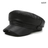 Black PU leather beret hat with a folded brim shown from the side.