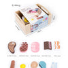 A wooden pretend play food cutting set for kids showing various food shapes and sizes.