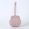 A pink silicone pacifier storage case with a lanyard attached, shaped like a cute bear face.