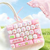 Pink cartoon animal stress relief keychain with a keyboard key design set