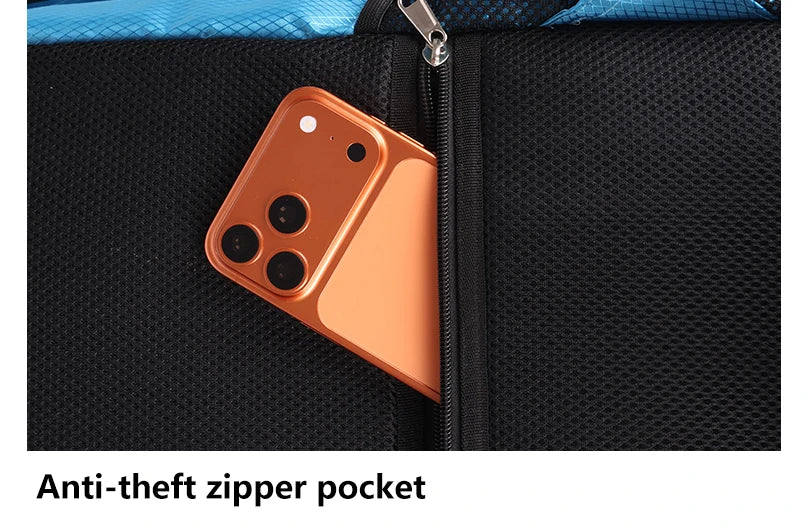 An anti-theft zipper pocket inside a black sports backpack showing an orange smartphone.