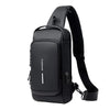 Bolso de pecho antirrobo para hombre, con correa acolchada y puerto de carga USB.