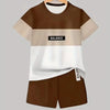 A brown and beige colorblock short sleeve t-shirt and matching shorts set displayed on a hanger.