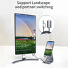 A monitor displaying a landscape and portrait switch feature connected to a smartphone adapter.
