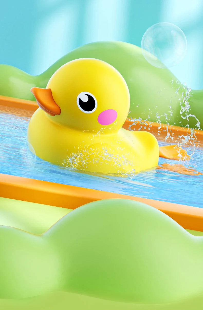 A yellow duck bath toy is shown splashing water in a blue tub, surrounded by green and orange plastic elements.