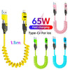 Retractable USB-C fast charging cable with 65W power delivery shown in yellow, green, and blue colors.
