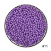 A pile of purple water beads in a circular dish.