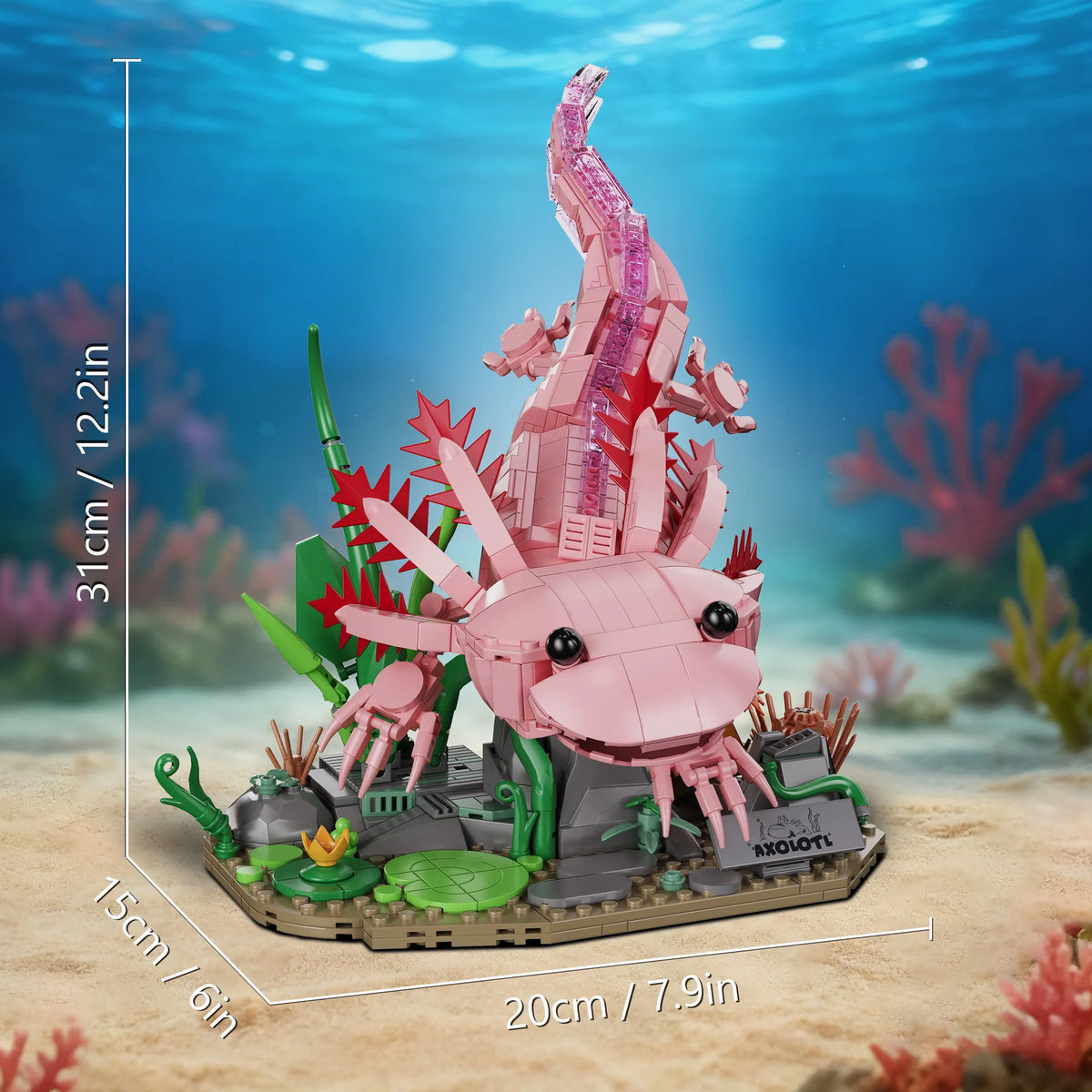 A pink sculpture of a dragon or sea creature is built on a base with green plants and coral in an underwater scene.