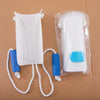 A white sock aid for seniors with blue accents is shown packaged in a clear plastic bag on brown cardboard.