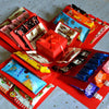 A collection of DIY explosion surprise gift box kits in various colors and designs packaged in red boxes.