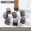 S-Black silicone furniture leg pads with felt bottoms for scratch protection shown on a white marble surface