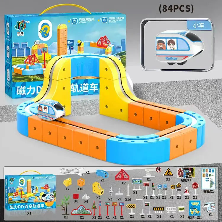 A set of magnetic train building blocks with a gravity maze track for children, featuring yellow and blue components.