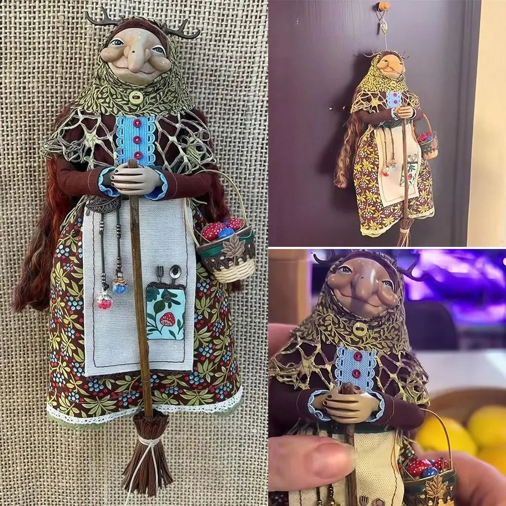 A handcrafted kitchen witch doll with antique charm featuring a face, horns, and detailed clothing.