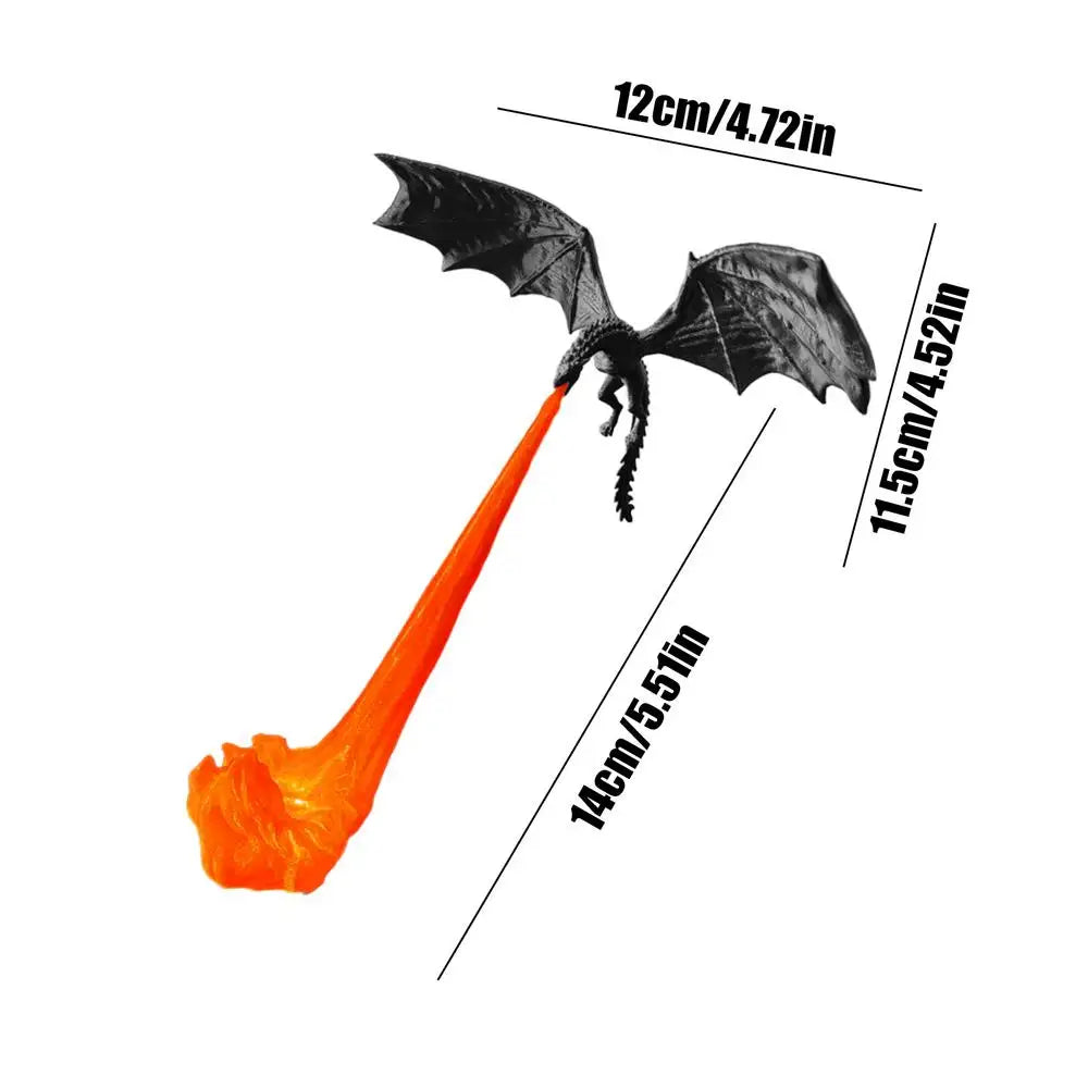Silhouette de dragon noir avec une lumière orange sortant de son museau, utilisée comme lampe décorative.