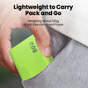 A hand holds a bright lime green lightweight power pack and go device.