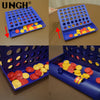 A blue foldable Connect 4 strategy board game with colorful plastic discs and a tray.