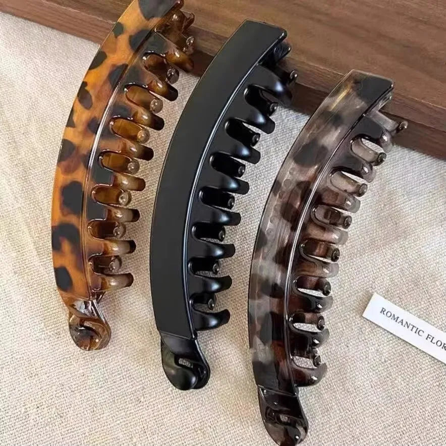 Par de horquillas de banana acrílicas esmeriladas con estampado de leopardo y patrones marrón oscuro para el cabello